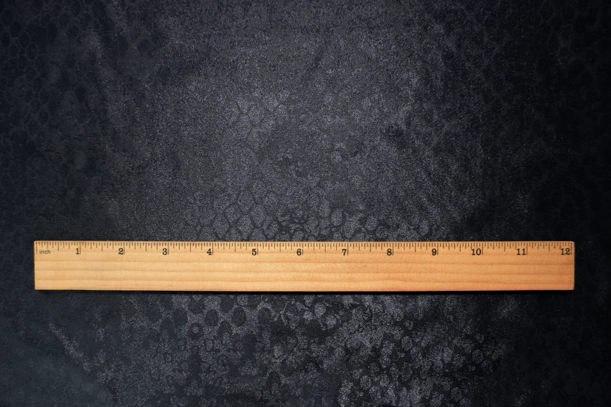 Black Famous Maker Nylon Spandex Reptile Satin Tricot Knit Fabric - Image 4