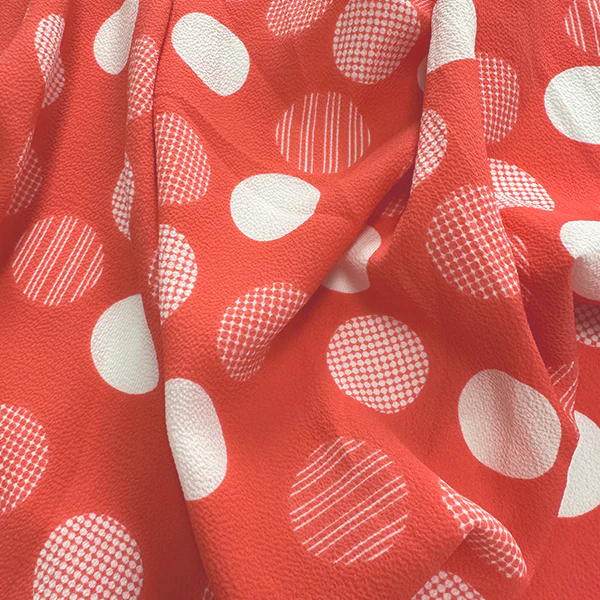 Coral and White Dot Georgette Fabric