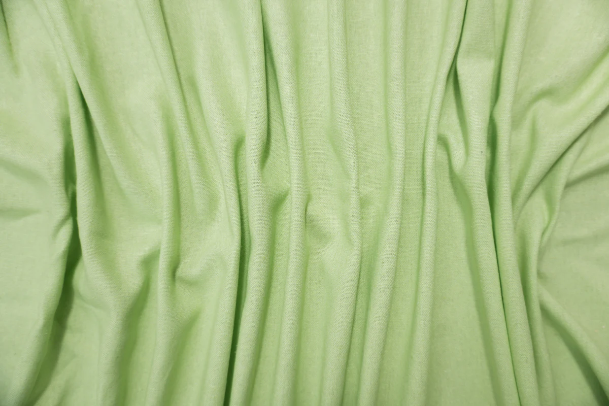 Light Lime Green Washed Rayon Linen Solid Reorderable Woven Fabric - Image 3