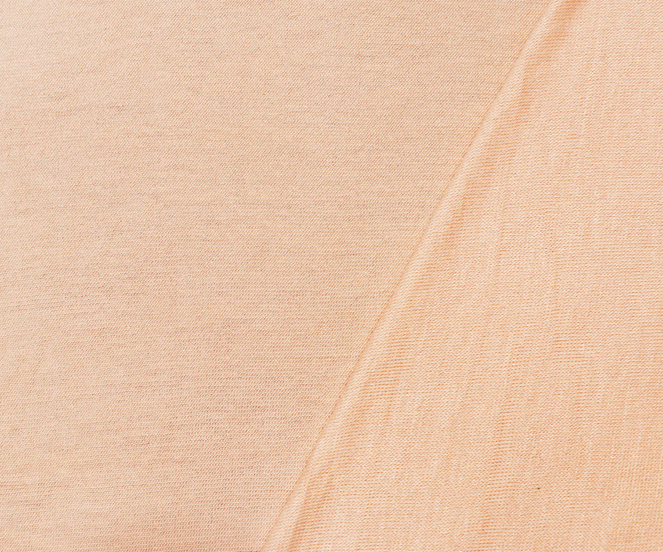 Light Peach Orange Rayon Semi-Sheer Stretch Jersey Knit Fabric - Image 2