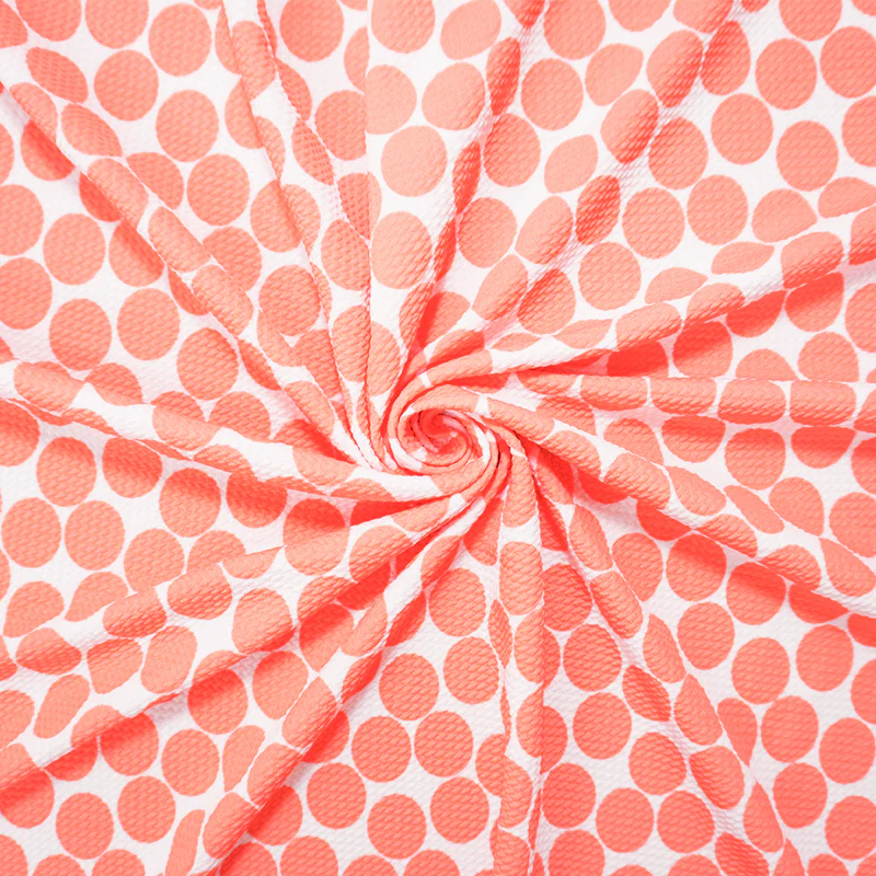 White-Peach Poly Dot Print Liverpool Double Knit Fabric